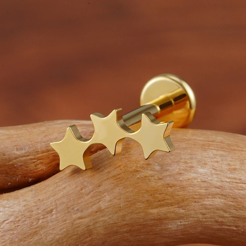 Boucle d'oreille dormeuse triple étoile