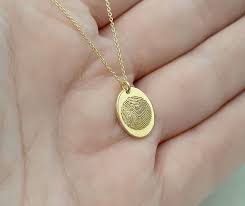 Embracing Sustainability: The Emotional Journey of Fingerprint Necklaces