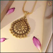 Golden Threads of Legacy: The Charm Gold Necklace