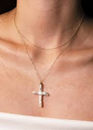 The Elegance of Faith: The Journey of the Pearl Cross Necklace
