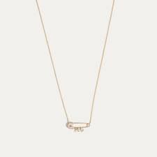 The Heartfelt Symbolism of the Safety Pin Necklace in Love
