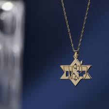 The Meaning Behind the Gold Star of David Necklace