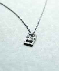 The Timeless Allure of the Number Nine Lock Necklace