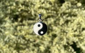 The Timeless Balance: Taoist Yin Yang Cross Necklace in Modern Jewelry