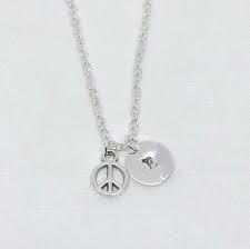 The Timeless Symbol of Unity: A Personalized Peace Sign Necklace