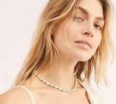 Timeless Memories: The Enduring Allure of Puka Shell Necklaces