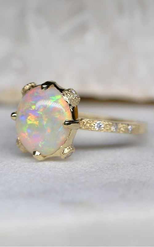The Allure of Color: Opal Engagement Rings in Focus