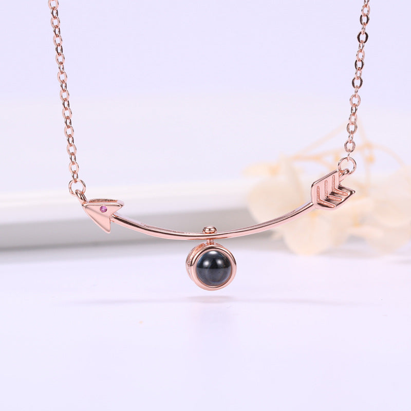 Amors Pfeil-Halskette mit verstecktem Foto