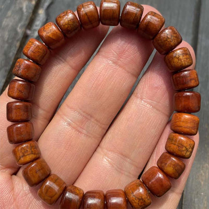 Bracelet de force en agate rouge et corne de mouton en os de yak tibétain à trois yeux et perles dzi 