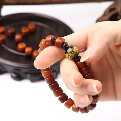 Bracelet de force en agate rouge et corne de mouton en os de yak tibétain à trois yeux et perles dzi 