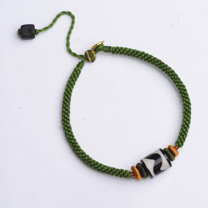 Bracelet de protection en corde verte tressée et perles dzi tibétaines faites à la main avec pierres de Bouddha 