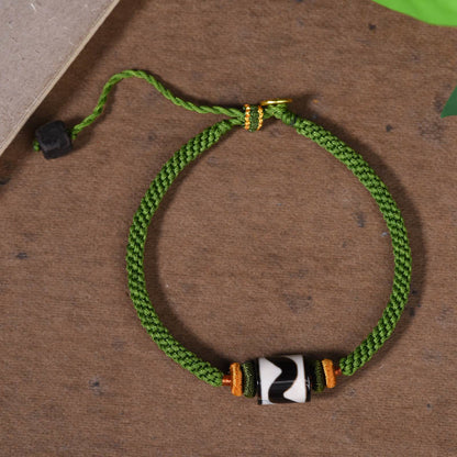 Bracelet de protection en corde verte tressée et perles dzi tibétaines faites à la main avec pierres de Bouddha 