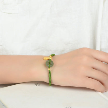 Bracelet en corde verte avec boucle de paix en jade vert et pierres de Bouddha