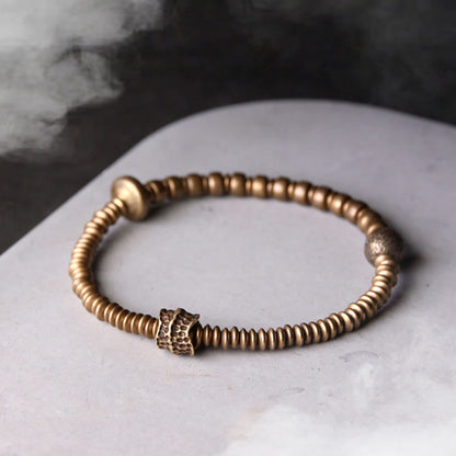 Bracelet en laiton et cuivre avec pierres de Bouddha