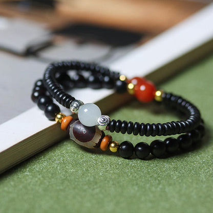 Buddha Stones Ebenholz Sandelholz Grün Sandelholz Dzi Perle Balance Calm Doppel Wickelarmband 
