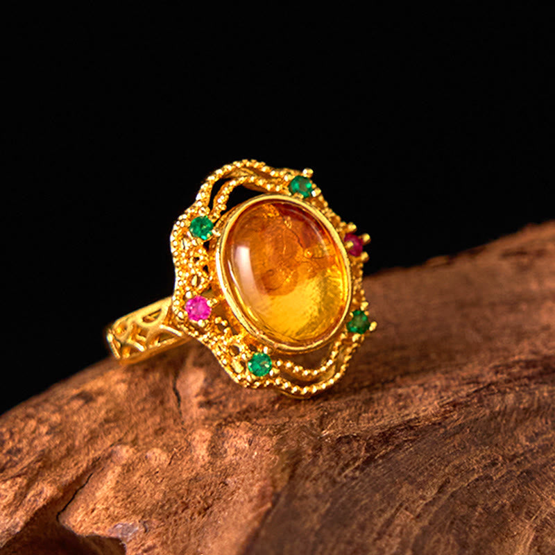 Bague ajustable en dentelle creuse avec pierres de Bouddha et fleur d'ambre 
