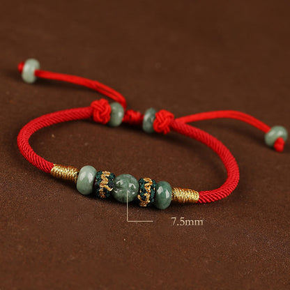 Bracelet en corde rouge avec perles de boulier en jade et pierres de Bouddha