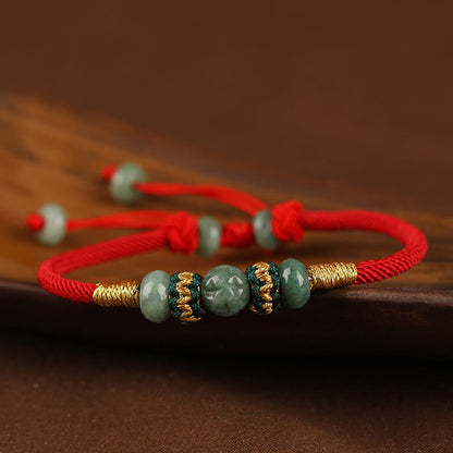 Bracelet en corde rouge avec perles de boulier en jade et pierres de Bouddha