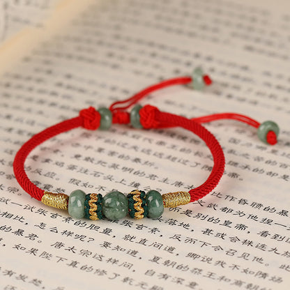 Bracelet en corde rouge avec perles de boulier en jade et pierres de Bouddha