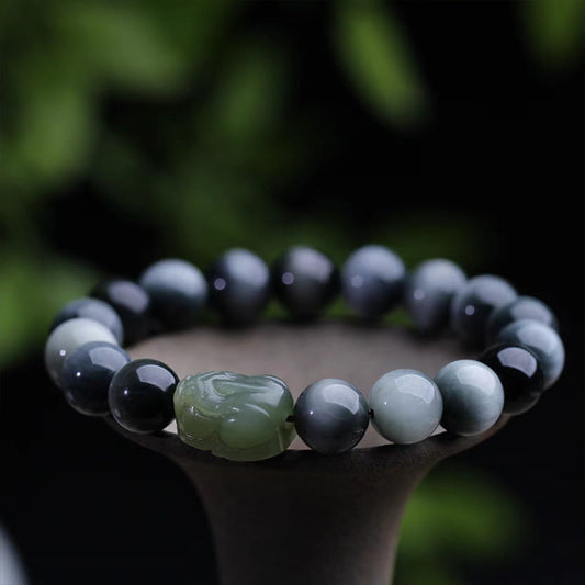 Bracelet de confiance Pixiu en jade Hetian en pierre naturelle œil d'aigle de Bouddha