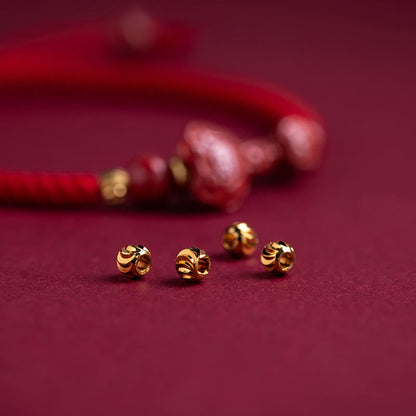 Bracelet tressé en fil rouge fait main avec poignée en cinabre Ruyi et caractère Fu PiXiu