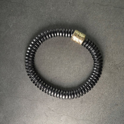 Bracelet calme en bois d'ébène et cuivre et laiton avec pierres de Bouddha 