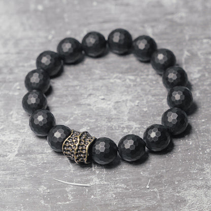 Bracelet de protection en cuivre et laiton avec pierres de Bouddha givrées mates et onyx noir 