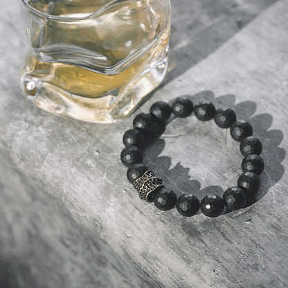 Bracelet de protection en cuivre et laiton avec pierres de Bouddha givrées mates et onyx noir 