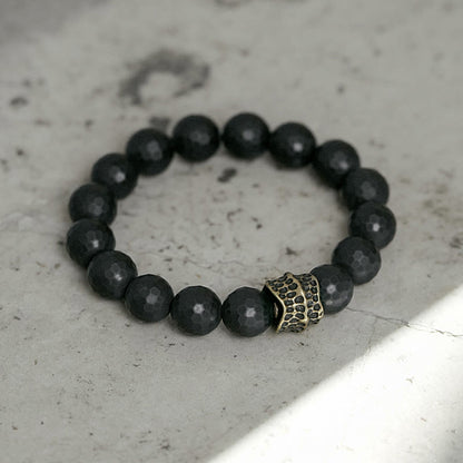 Bracelet de protection en cuivre et laiton avec pierres de Bouddha givrées mates et onyx noir 