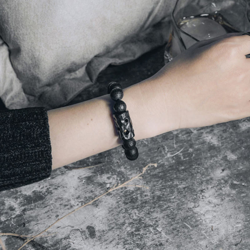 Bracelet de protection en onyx noir et ébène avec pierres de Bouddha et surface givrée mate 