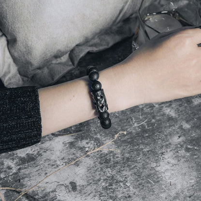 Bracelet de protection en onyx noir et ébène avec pierres de Bouddha et surface givrée mate 