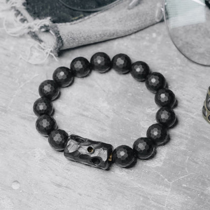 Bracelet de protection en onyx noir et ébène avec pierres de Bouddha et surface givrée mate 