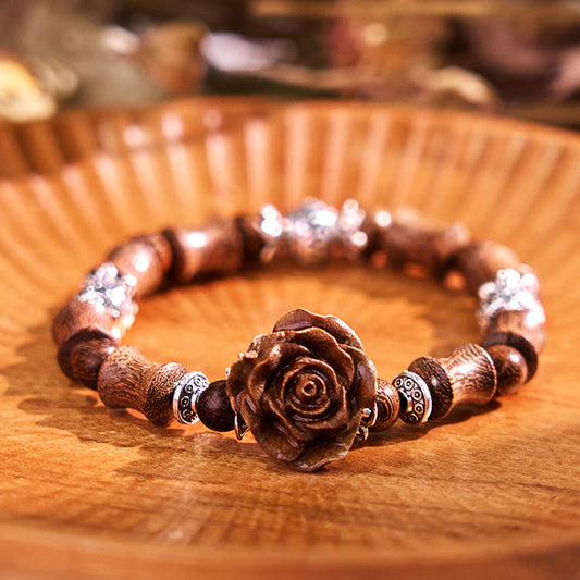 Bracelet de guérison camélia en bois de santal et bambou avec pierres de Bouddha