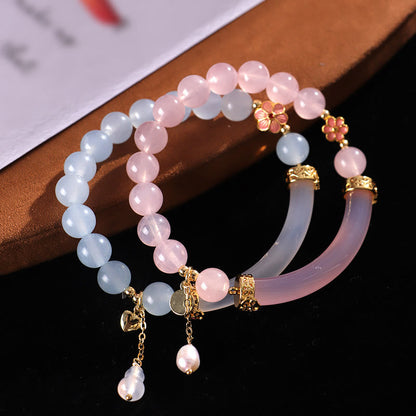 Bracelet manchette demi-jonc en perles de calcédoine bleue et cristal rose de Bouddha 
