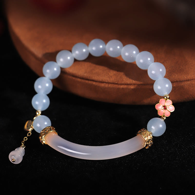 Bracelet manchette demi-jonc en perles de calcédoine bleue et cristal rose de Bouddha 
