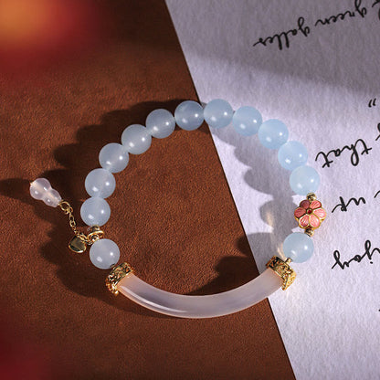Bracelet manchette demi-jonc en perles de calcédoine bleue et cristal rose de Bouddha 