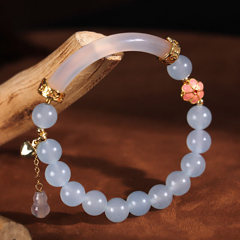 Bracelet manchette demi-jonc en perles de calcédoine bleue et cristal rose de Bouddha 