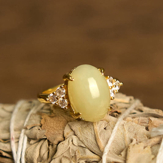 Bague en alliage d'œuf de jade Hetian avec pierres de Bouddha 