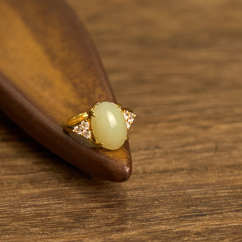 Bague en alliage d'œuf de jade Hetian avec pierres de Bouddha 