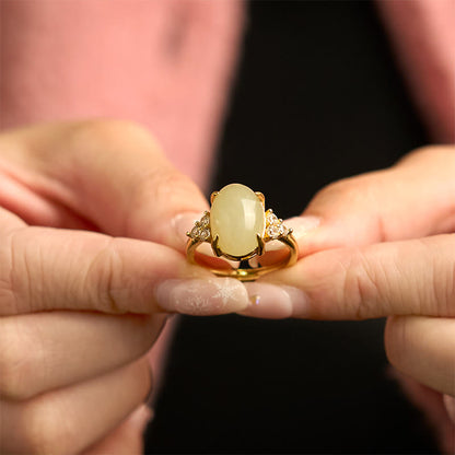 Bague en alliage d'œuf de jade Hetian avec pierres de Bouddha 