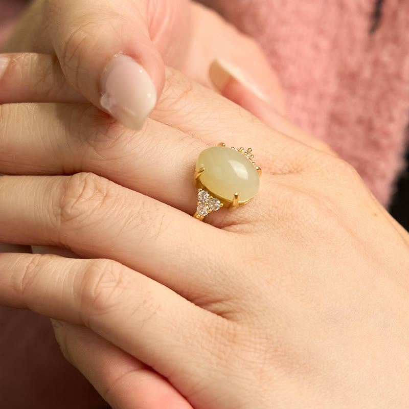 Bague en alliage d'œuf de jade Hetian avec pierres de Bouddha 