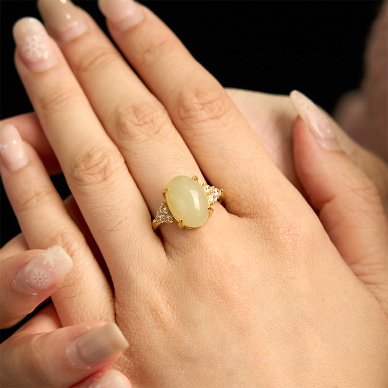 Bague en alliage d'œuf de jade Hetian avec pierres de Bouddha 