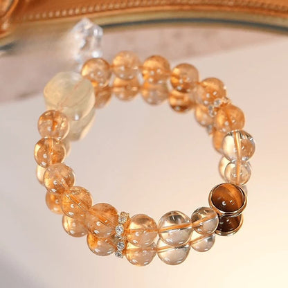 Buddha Stones Topaz Citrine Tiger Eye Zakiram Goddess of Wealth Bracelet