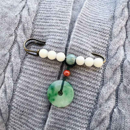 Broche porte-bonheur en jade et pierre de Bouddha