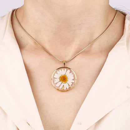 Collier de fleurs de naissance pressées