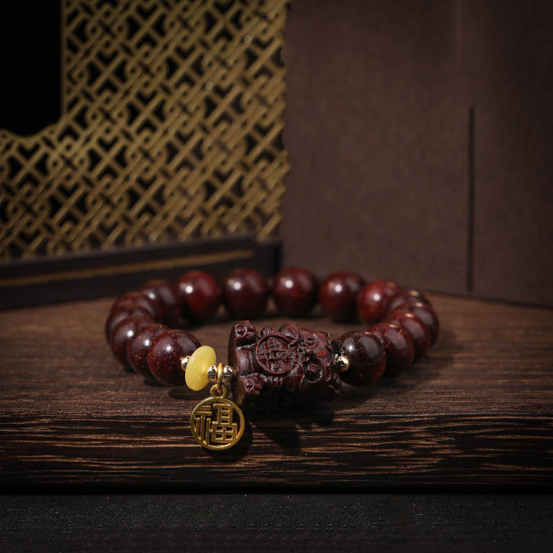 Buddha Stones Small Leaf Red Sandalwood Gold Swallower Calm Bracelet