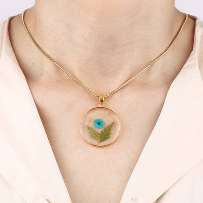 Collier de fleurs de naissance pressées