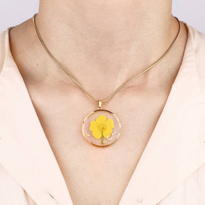 Collier de fleurs de naissance pressées