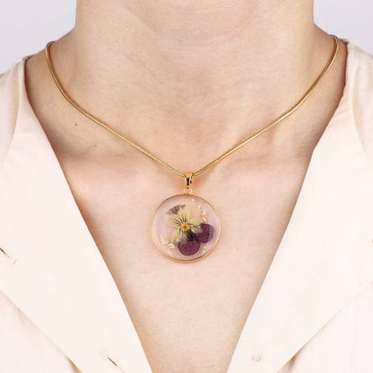 Collier de fleurs de naissance pressées