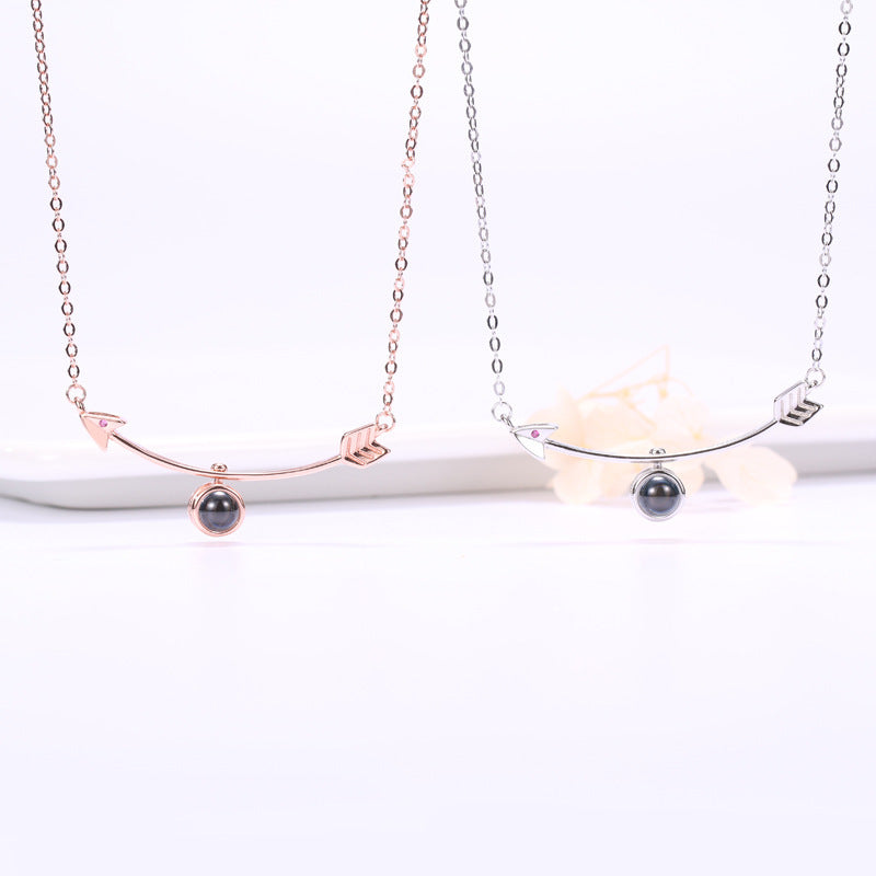 Amors Pfeil-Halskette mit verstecktem Foto